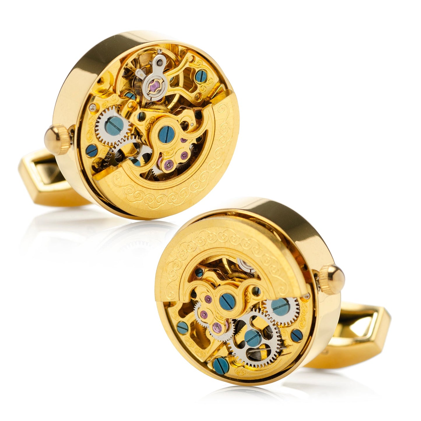 Gold mechanical cufflinks on a white background