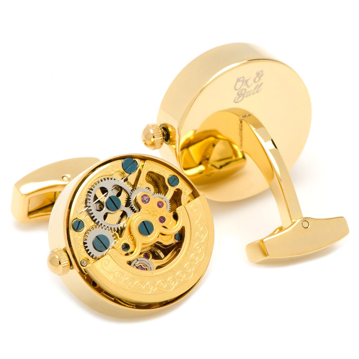 Gold cufflinks with mechanical design on a white background