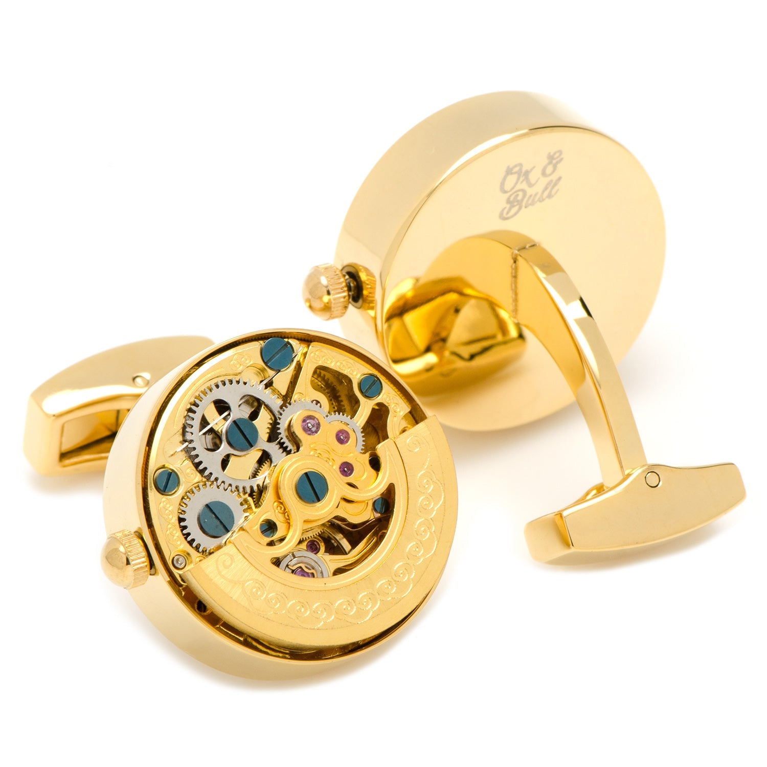 Gold cufflinks with mechanical design on a white background