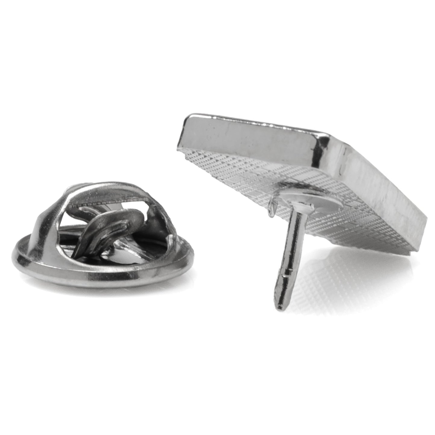 Metallic knot-shaped tie tack on a white background