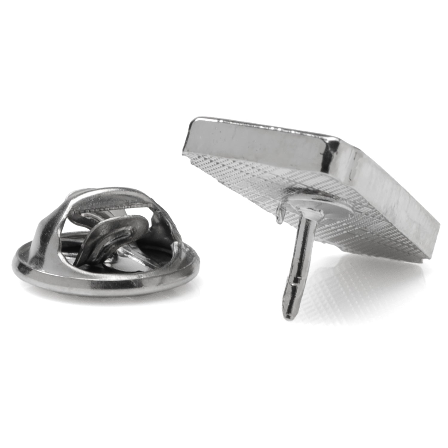 Metallic knot-shaped tie tack on a white background
