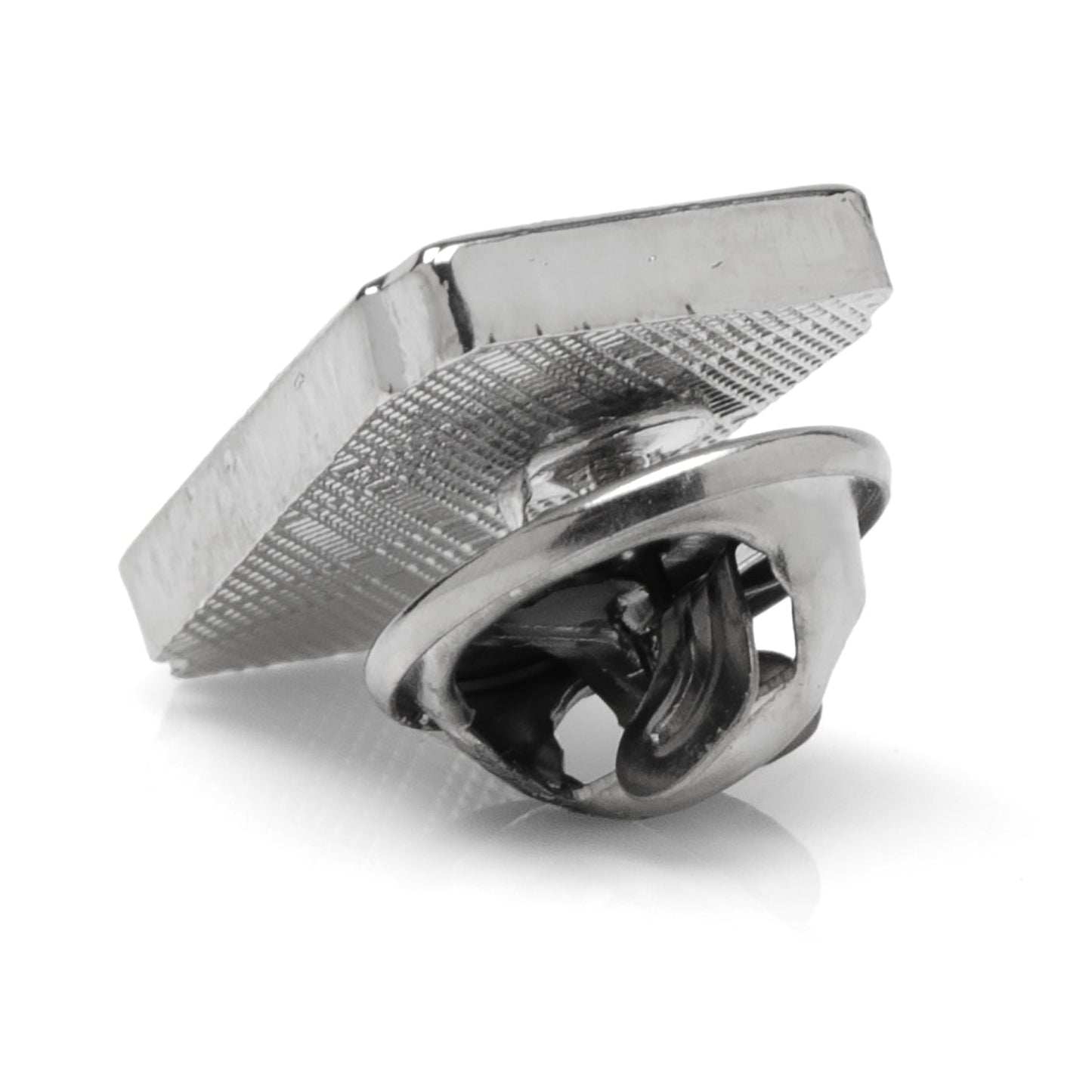 Metallic bottle opener on a white background