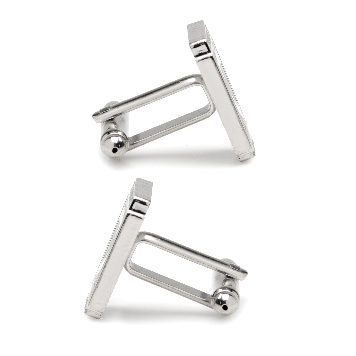 Pair of silver cufflinks on a white background