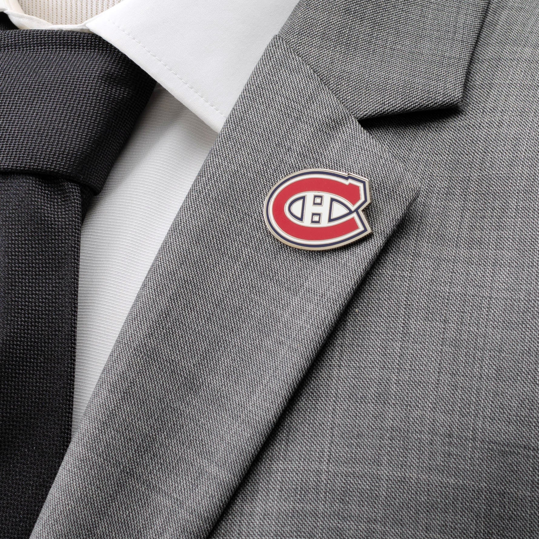 Gray suit jacket with a Montreal Canadiens logo pin
