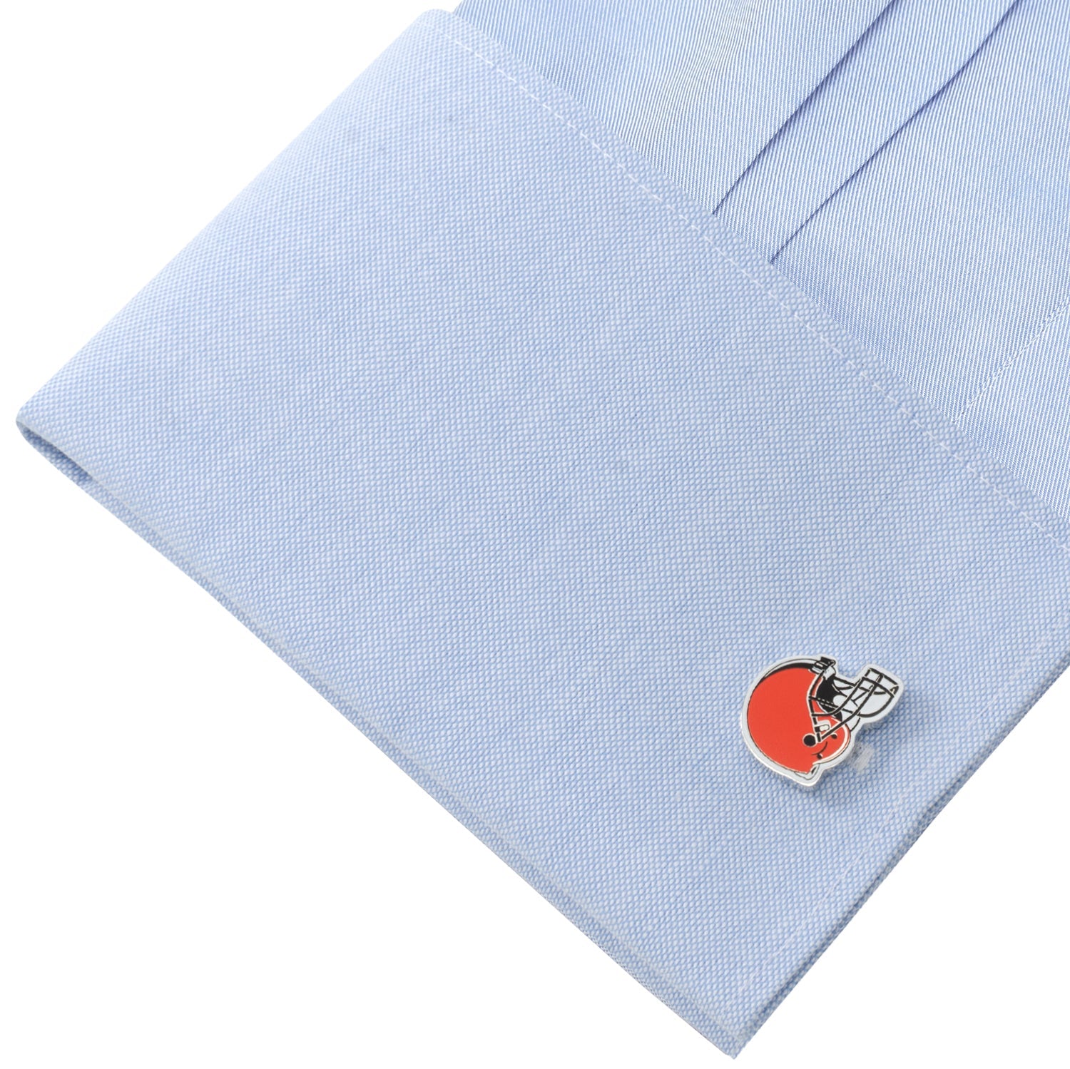 Cleveland Browns logo cufflinks on a light blue shirt