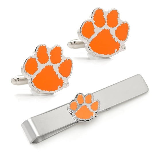 Orange paw print cufflinks and tie clip set on a white background