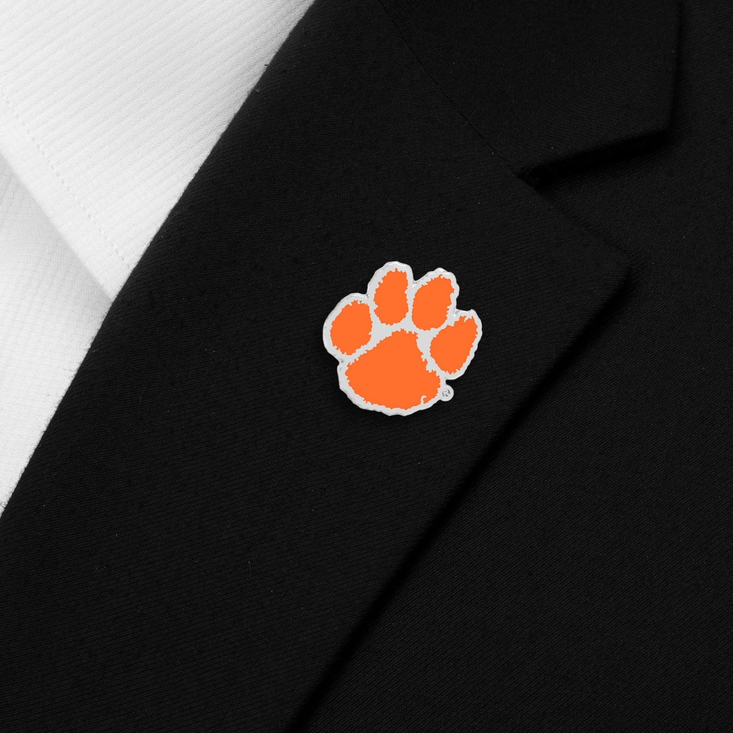 Black jacket with an orange and white paw print logo on a white background NCAA Clemson University Tigers Lapel Pin