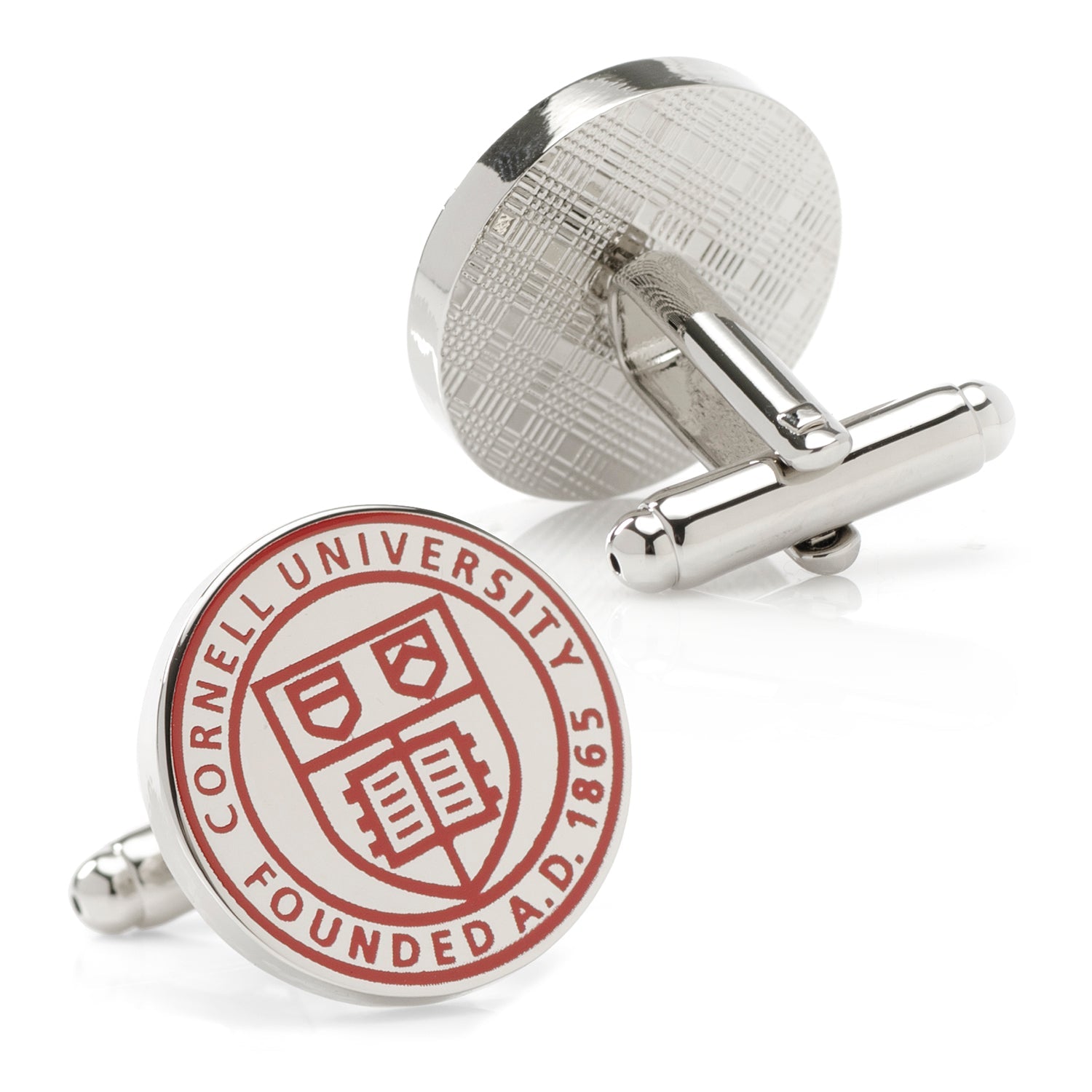 Silver cufflinks with Cornell University logo on a white background