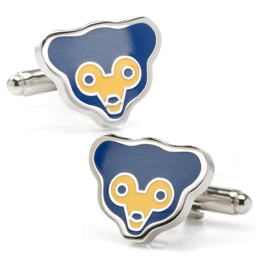 Pair of blue and yellow bear-shaped cufflinks on a white background