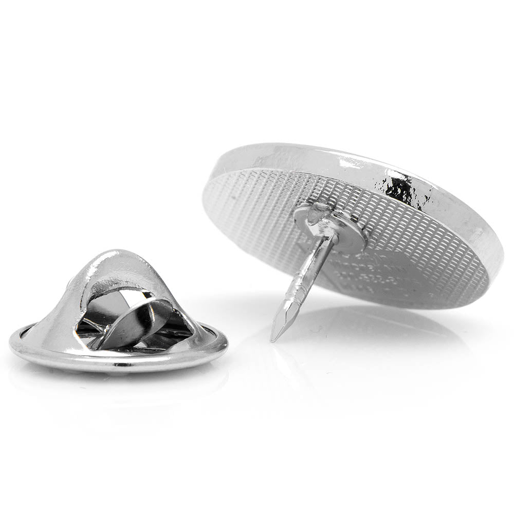 Silver cufflinks on a white background