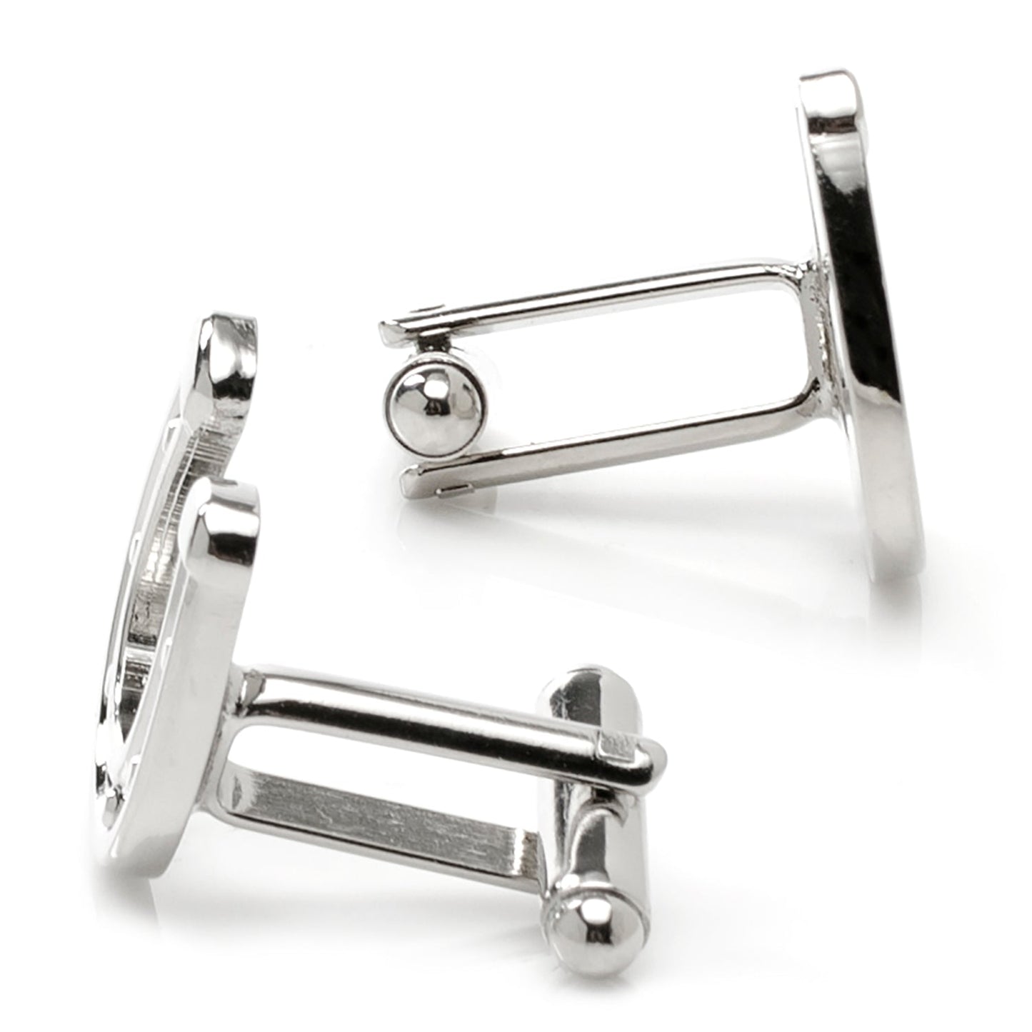 Silver cufflinks on a white background