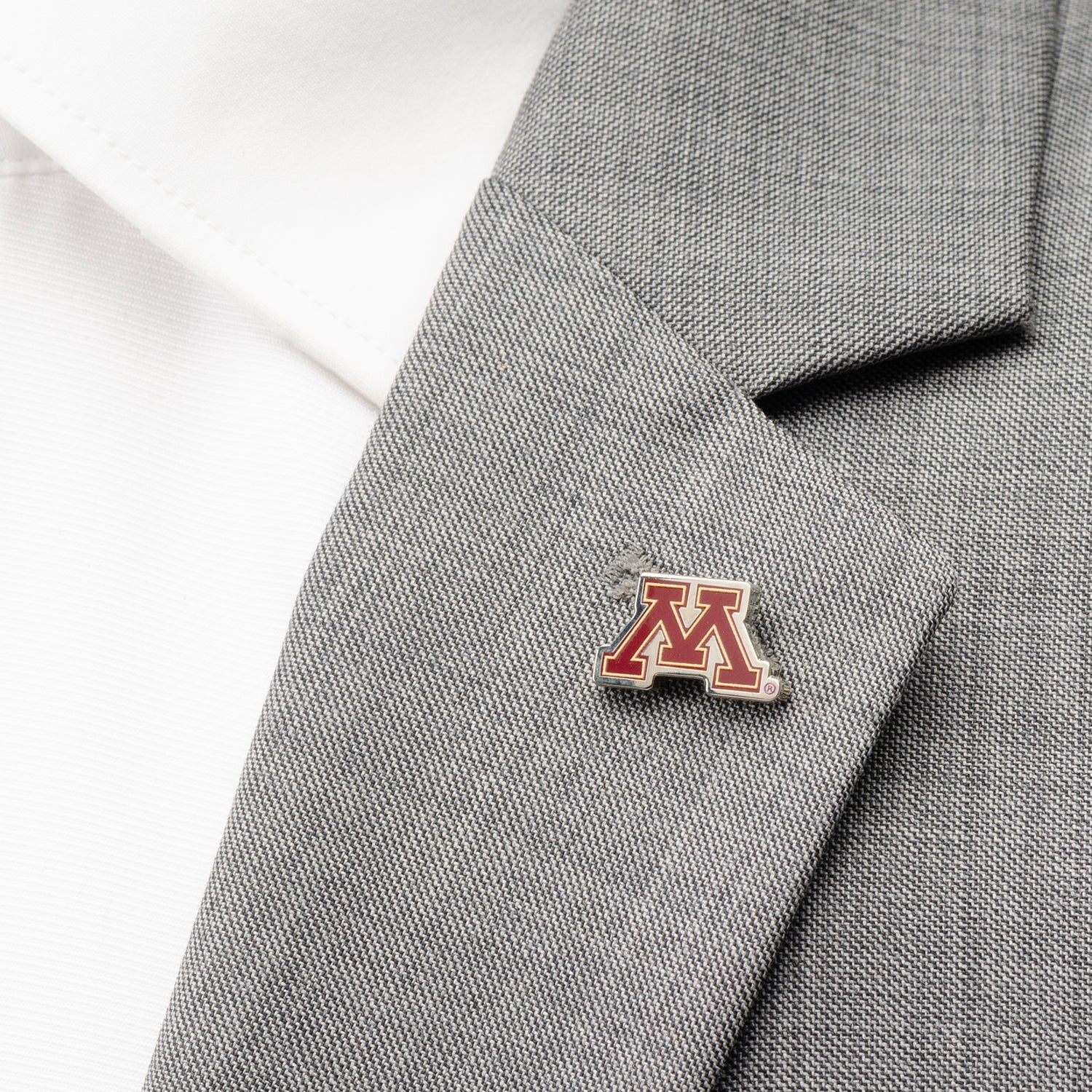 Lapel pin with a logo on a gray suit jacket NCAA Minnesota Gophers Lapel Pin 