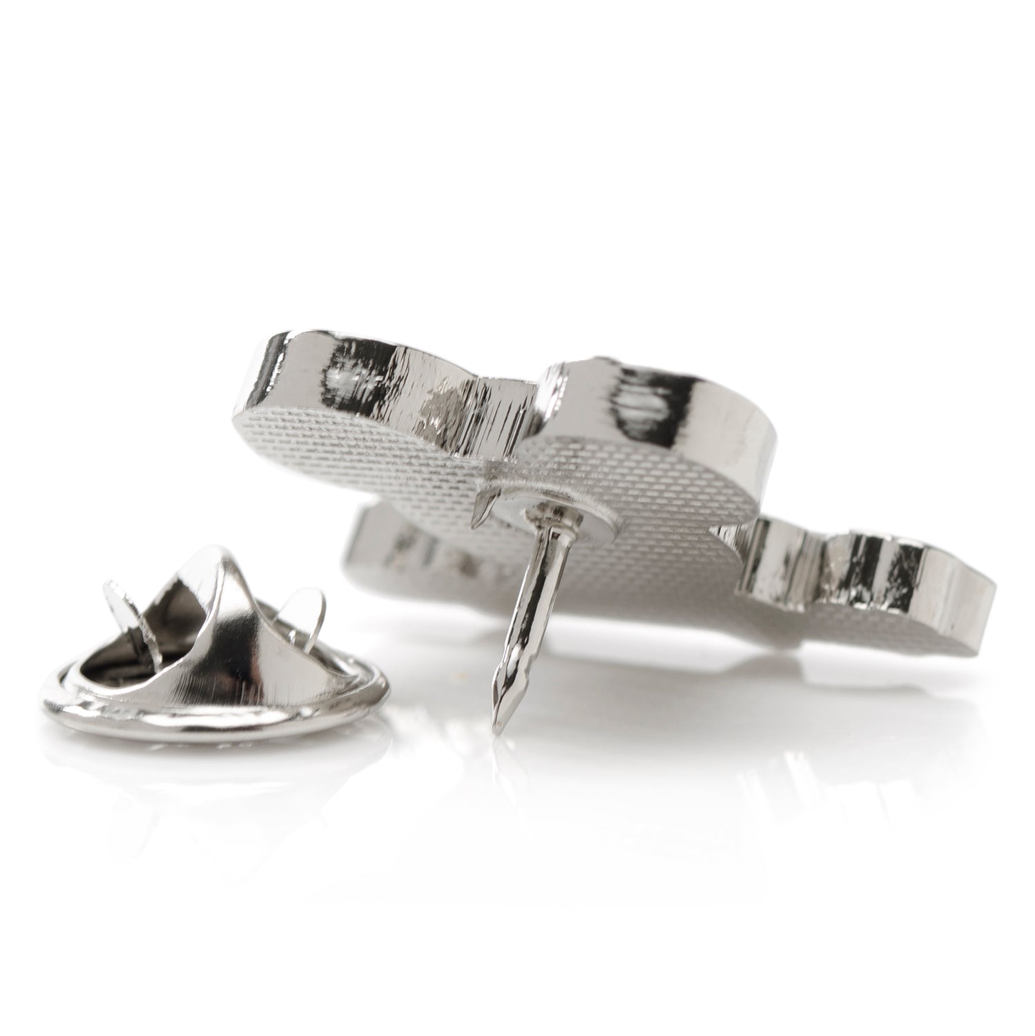 Silver cufflinks on a white background