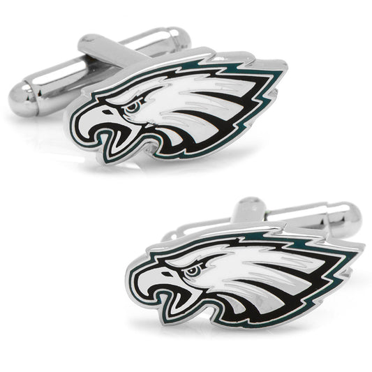 Pair of silver cufflinks with an eagle logo on a white background