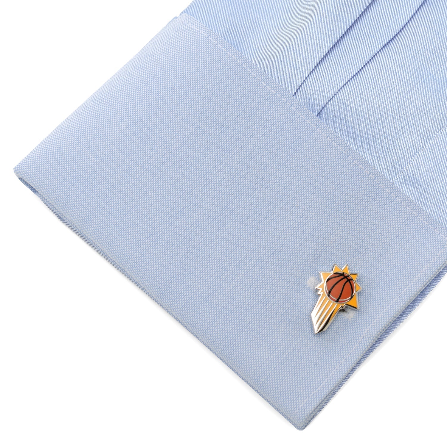 Basketball-themed lapel pin on a light blue dress shirt