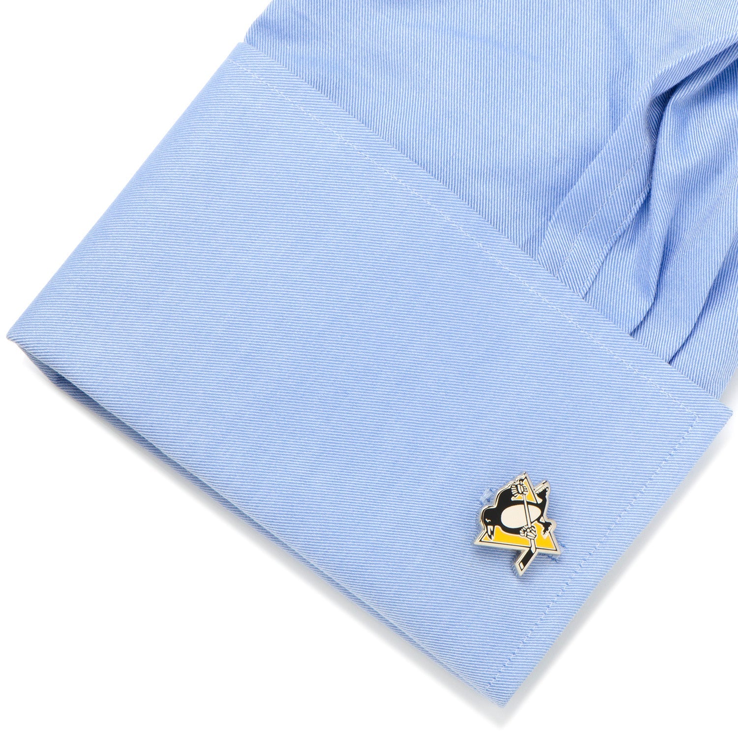 NHL Pittsburgh Penguins Cufflinks on light blue shirt