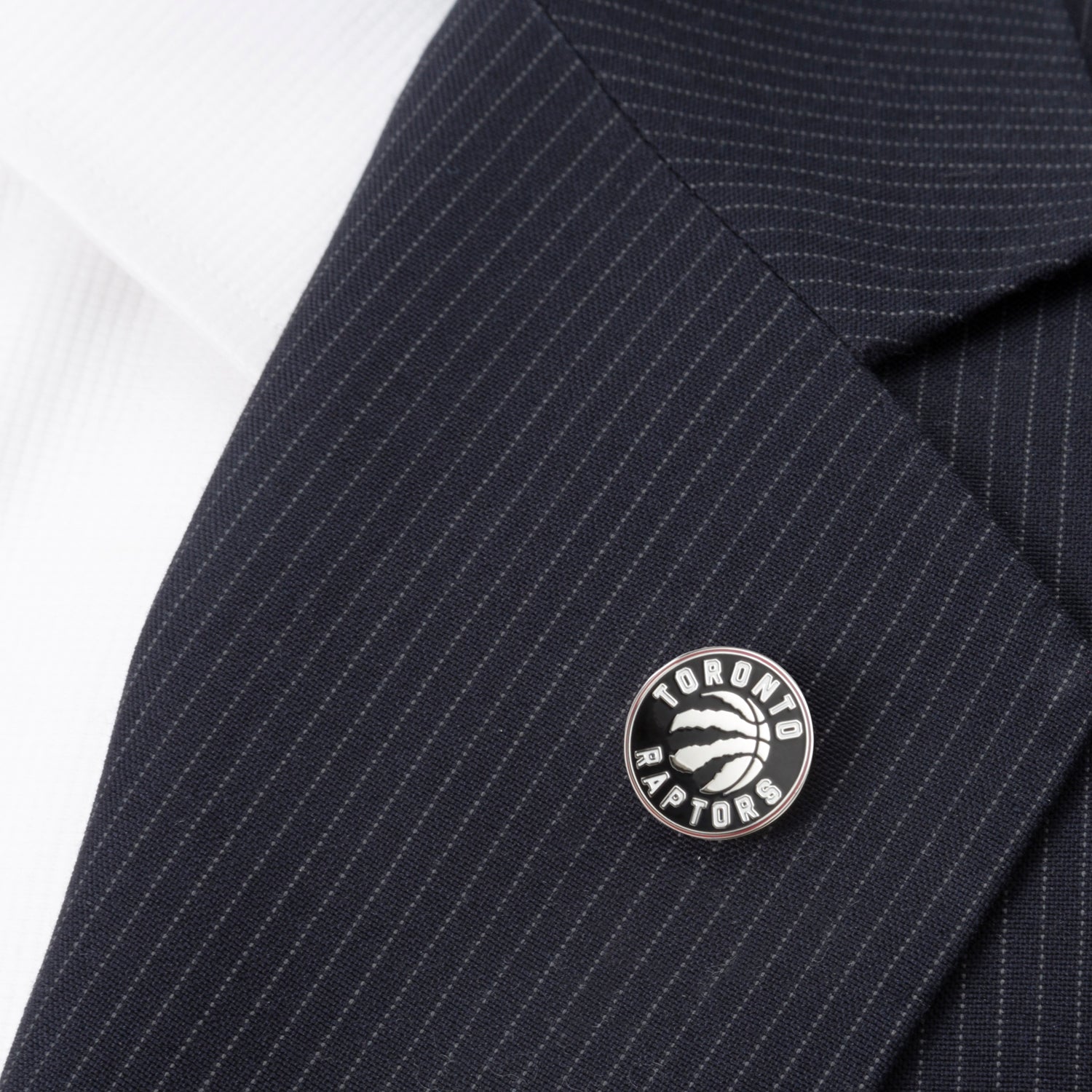 Toronto Raptors logo on a suit jacket