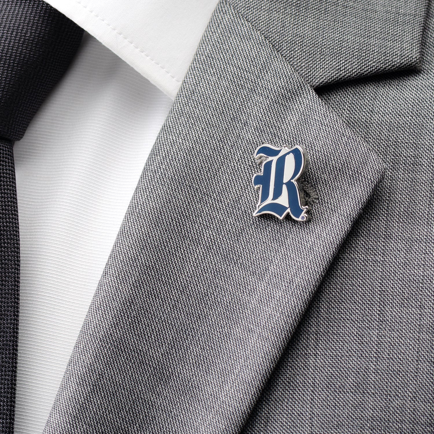 Features the iconic Rice University “R” logo in navy enamel