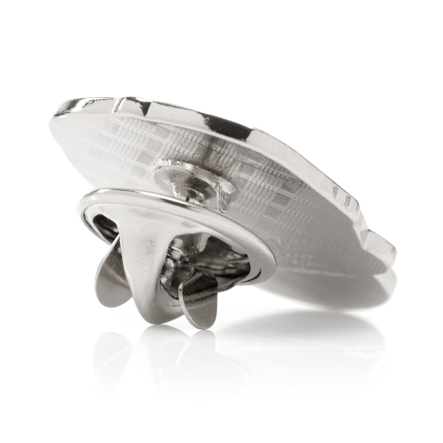 Metallic object with a reflective surface on a white background