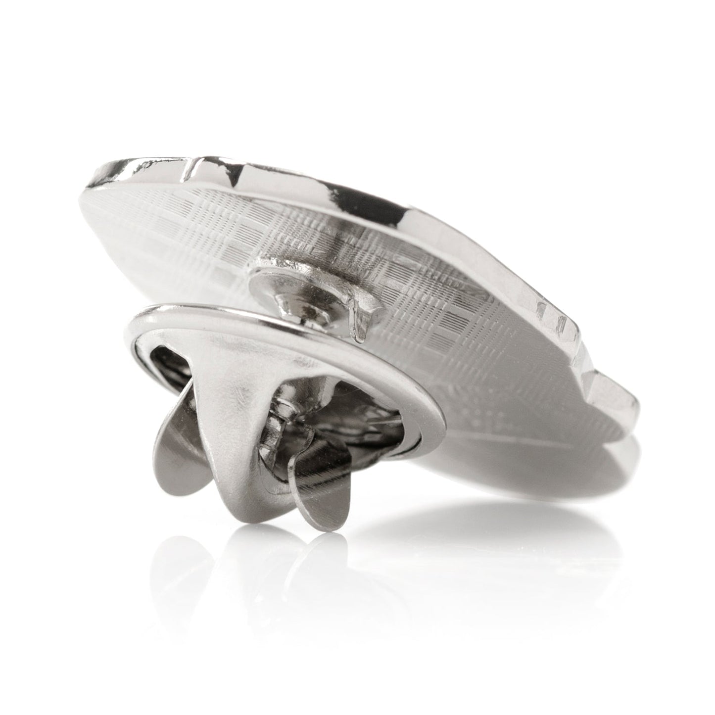 Metallic object with a reflective surface on a white background