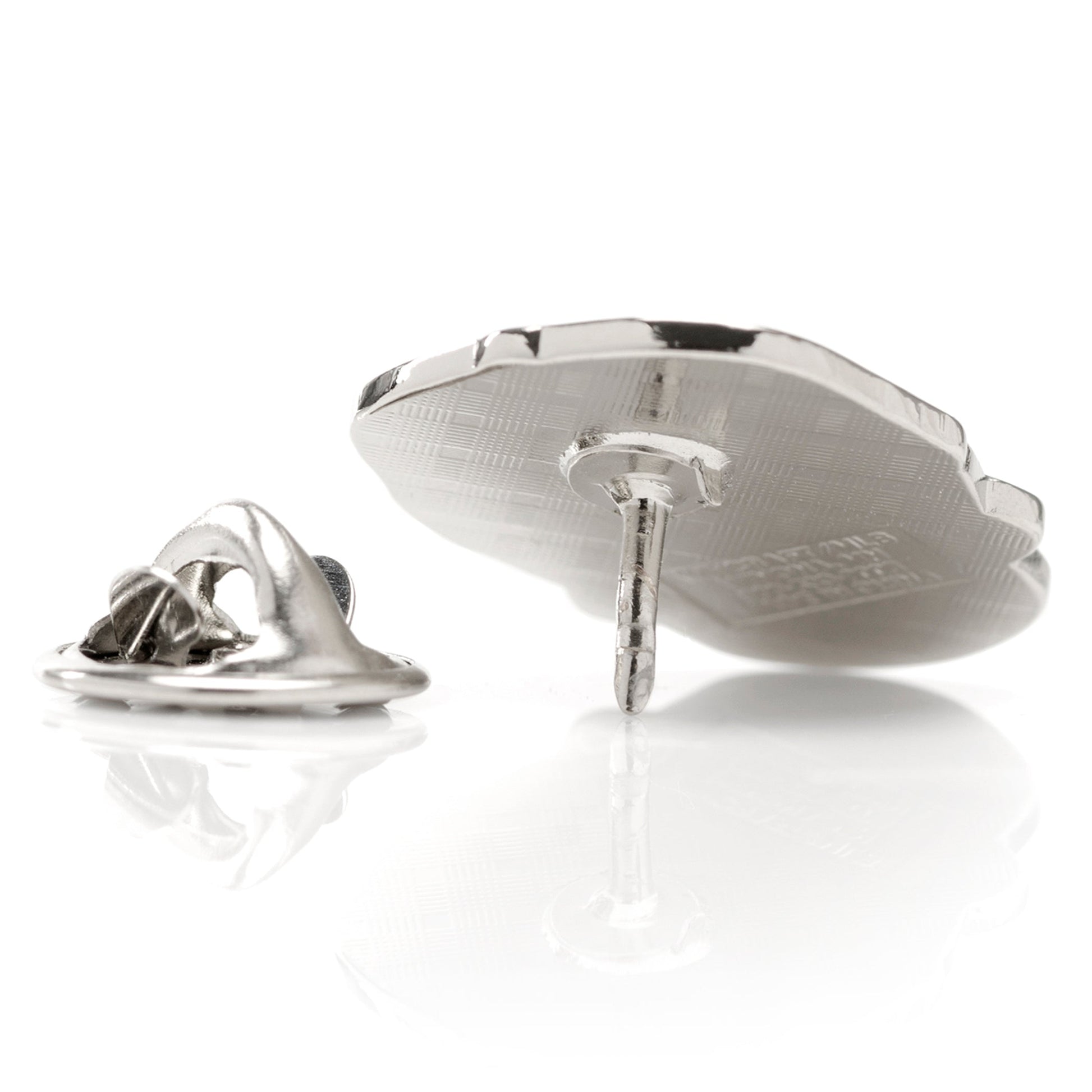 Silver lapel pin on a white background