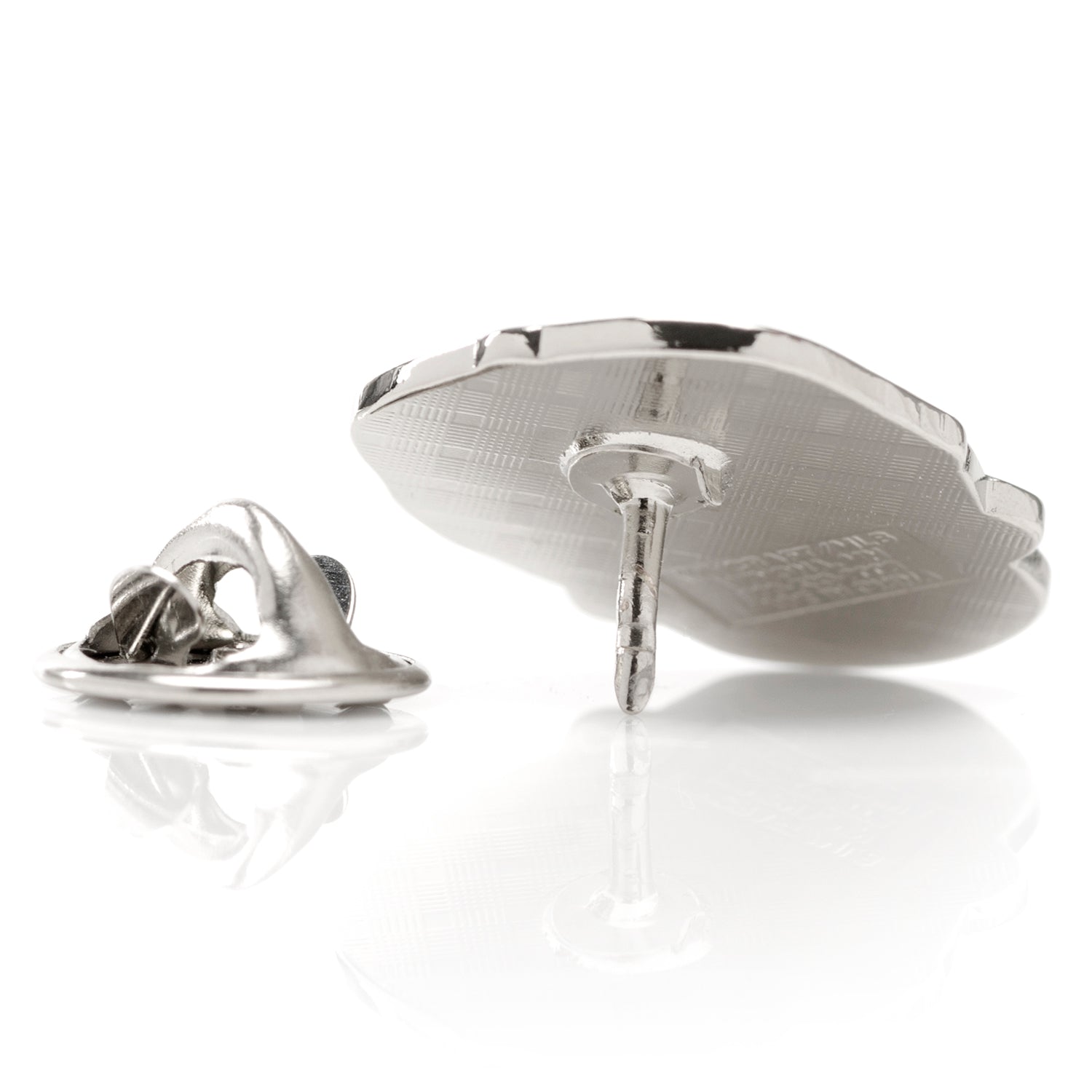 Silver lapel pin on a white background