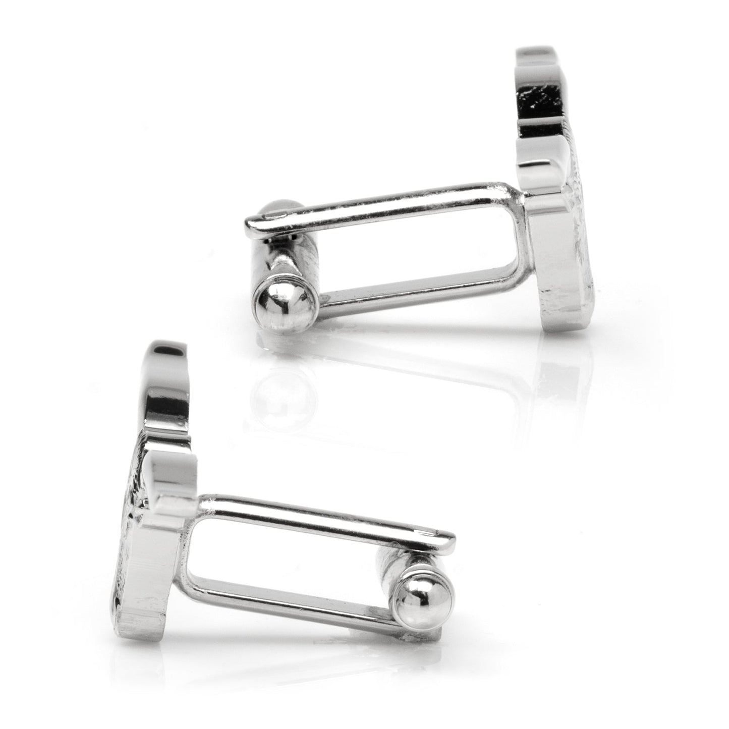 Silver cufflinks on a white background