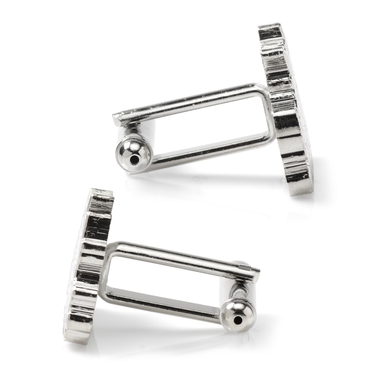 Pair of silver cufflinks on a white background