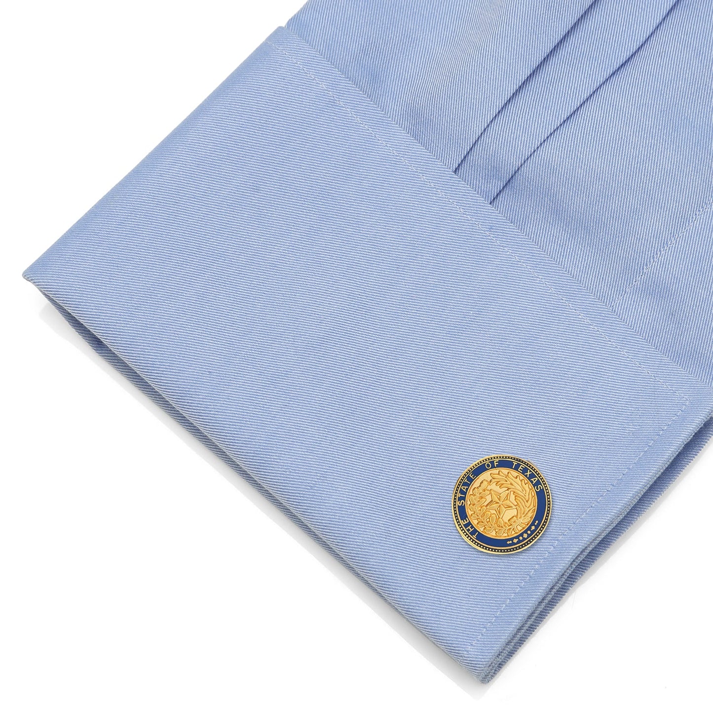 Light blue fabric with a gold emblem on a white background