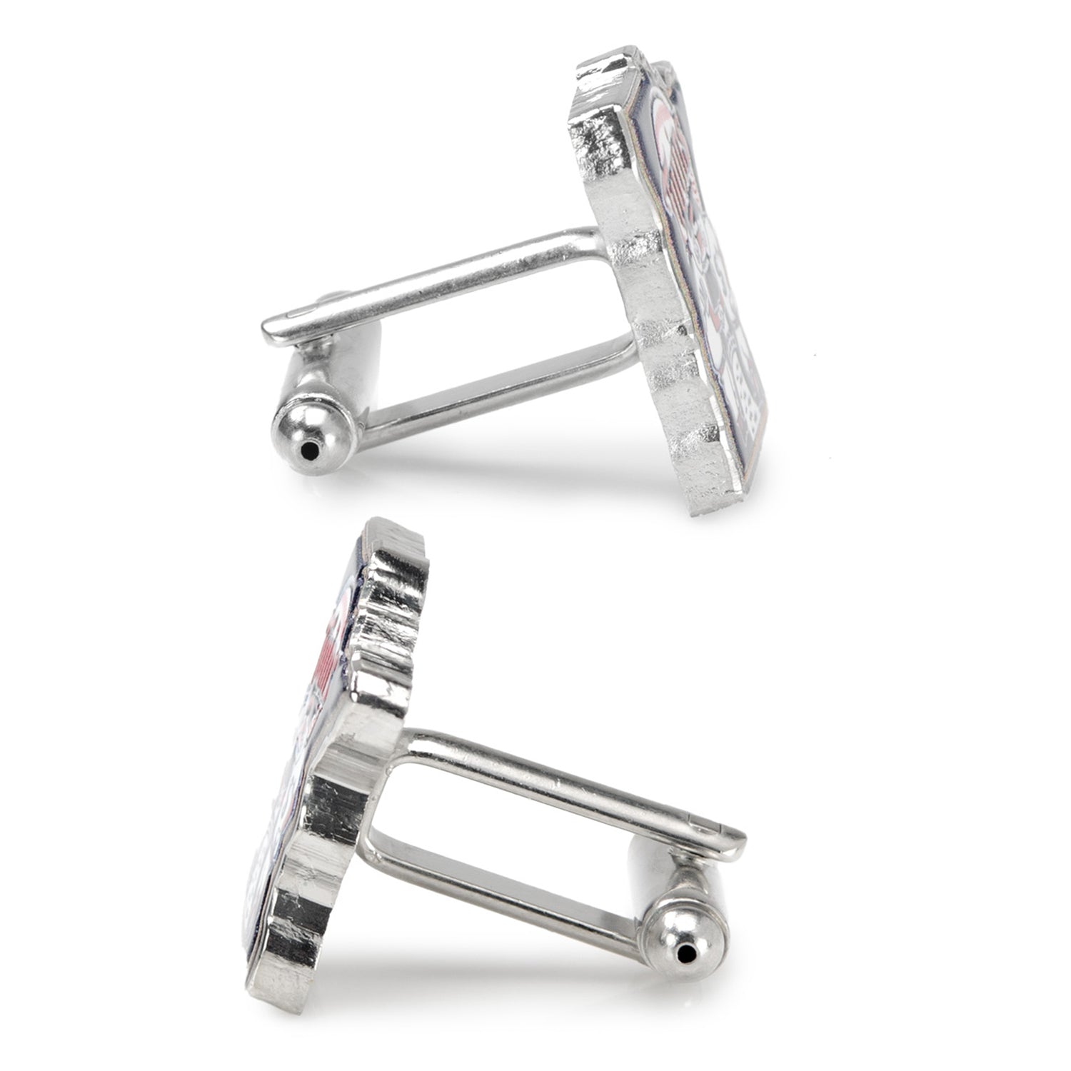 Silver cufflinks with a detailed design on a white background