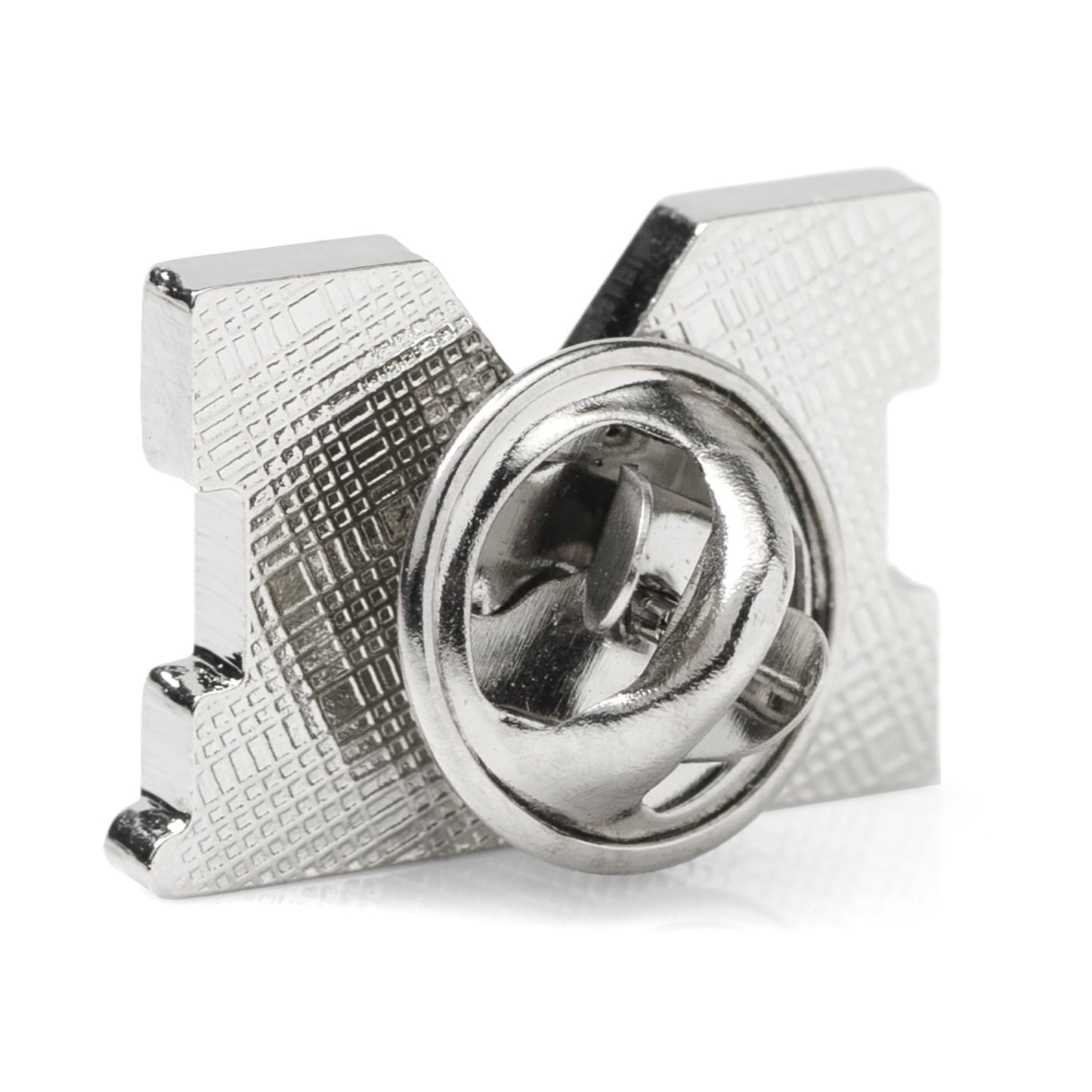Metallic knob with textured surface on a white background