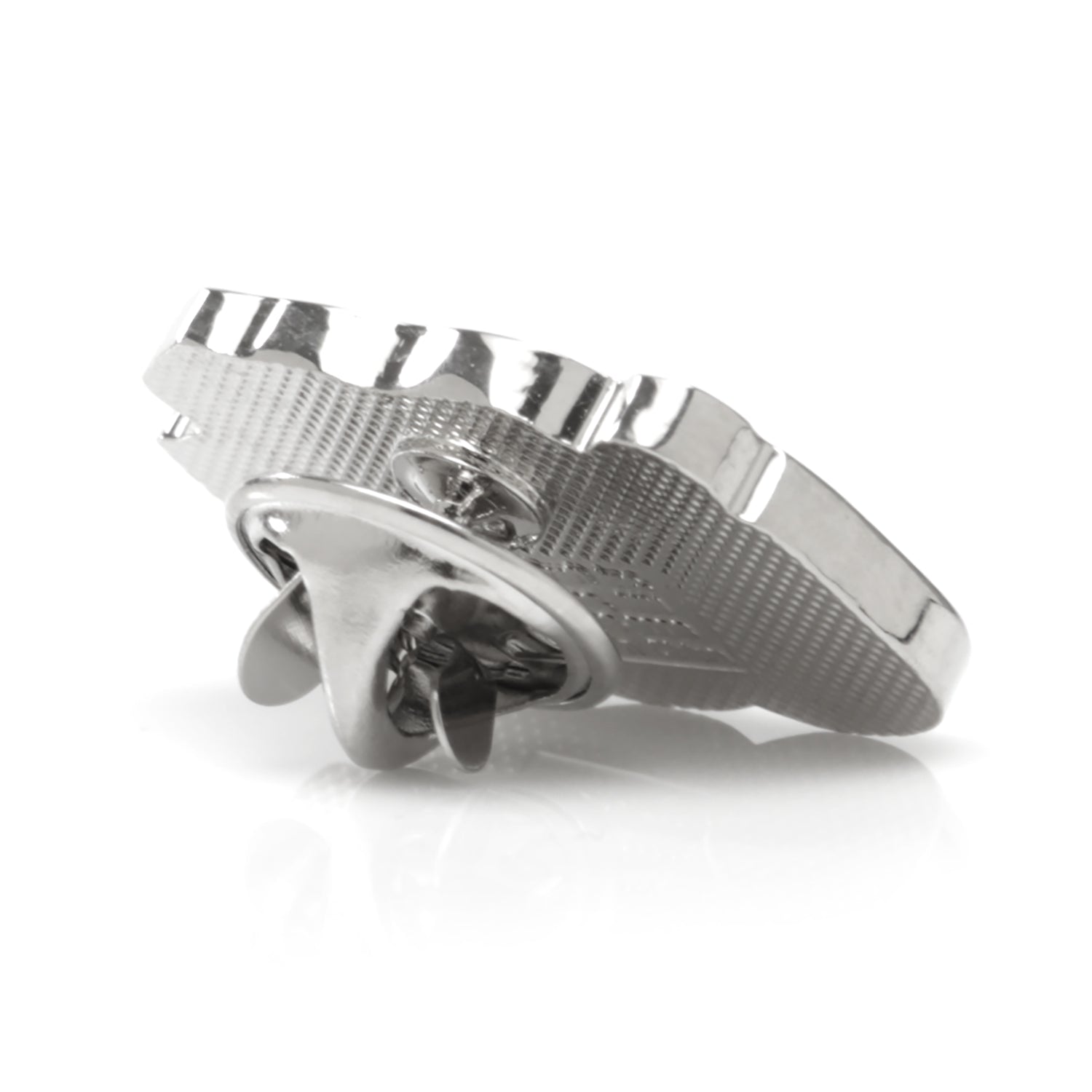 Metallic guitar tuning peg on a white background