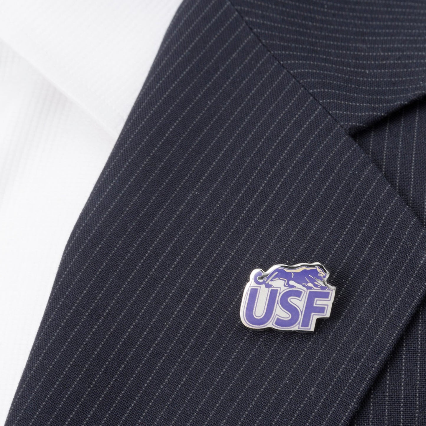 USF logo pin on a pinstripe suit jacket