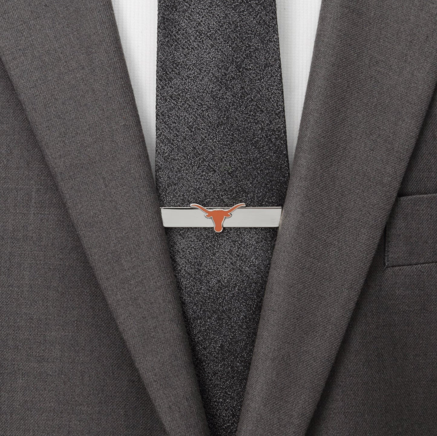 Gray suit jacket with a gray tie and a tie clip on a white background NCAA University of Texas Longhorns Tie Bar