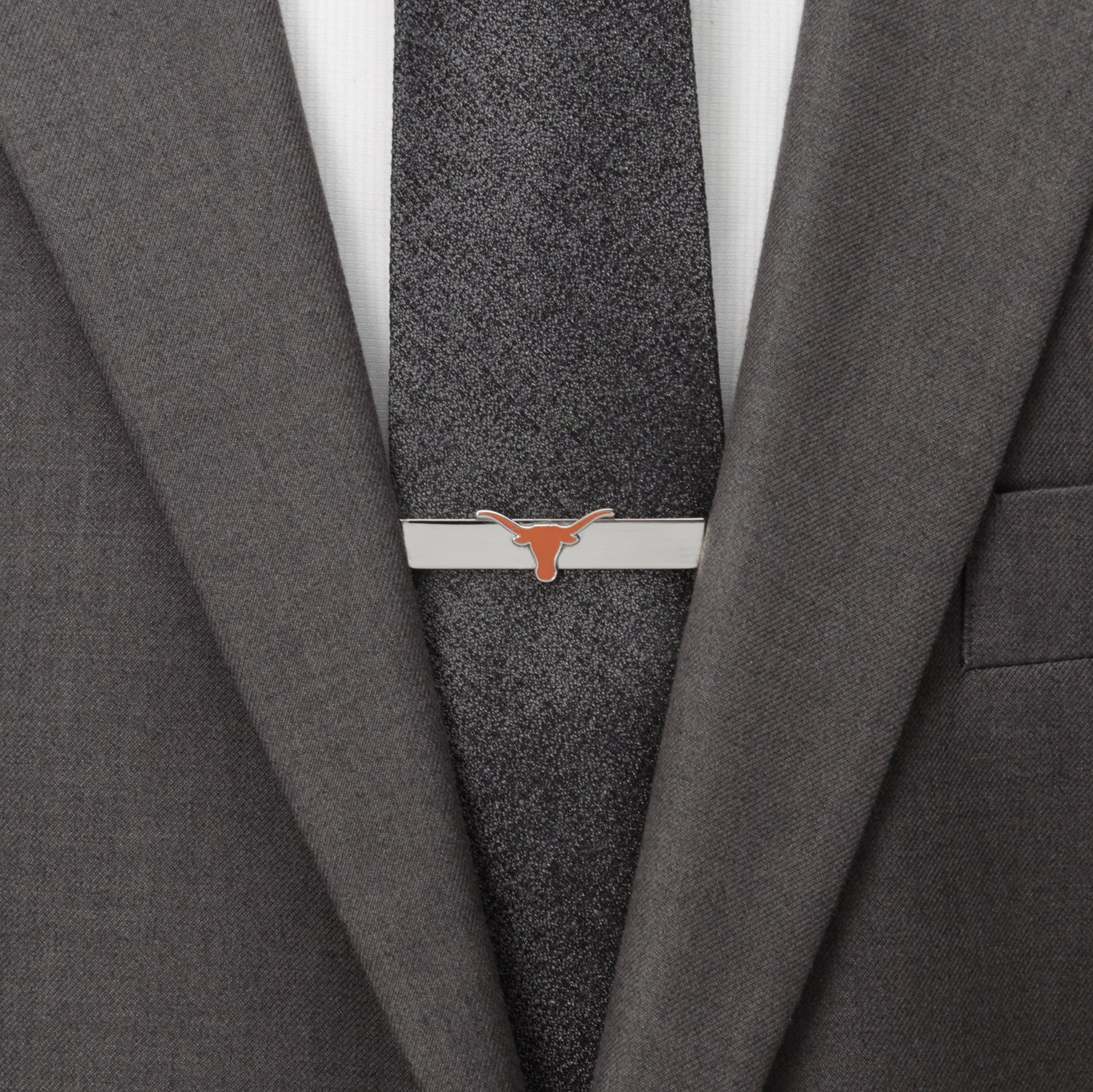 Gray suit jacket with a gray tie and a tie clip on a white background NCAA University of Texas Longhorns Tie Bar