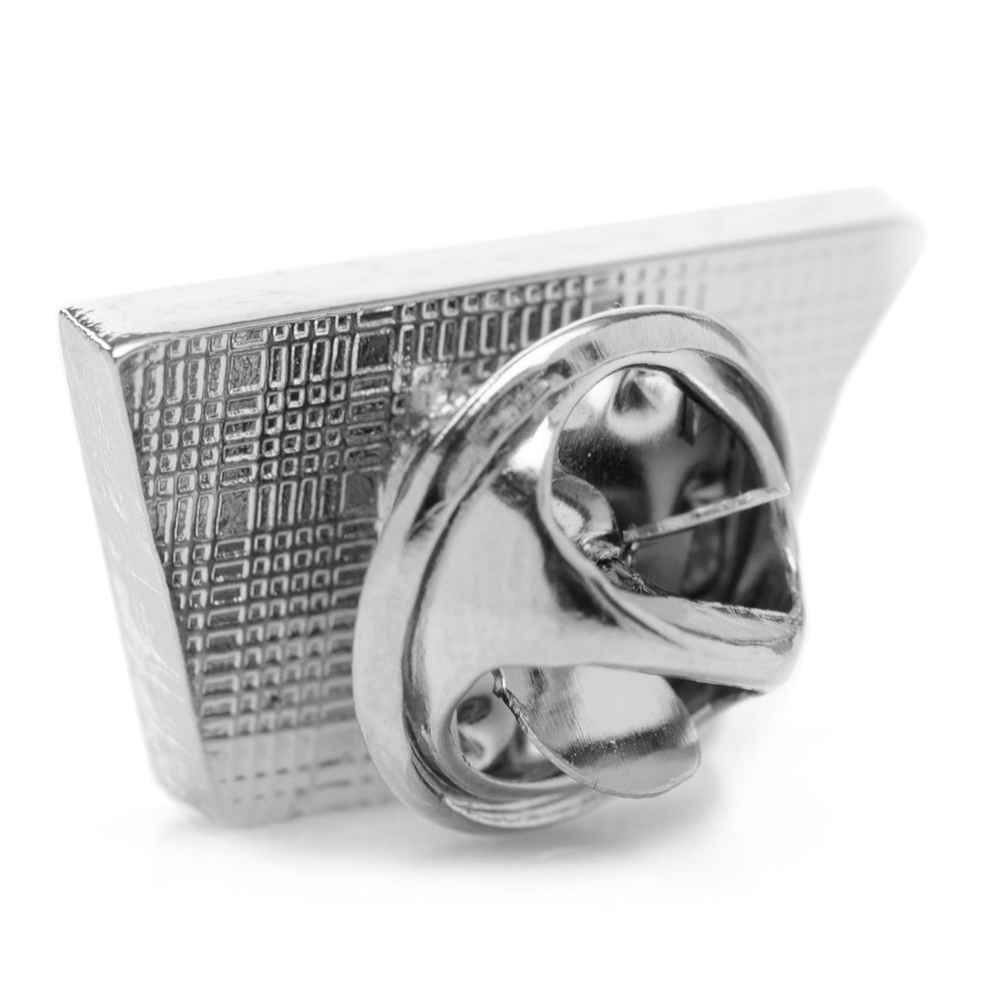 Silver tie clip with geometric design on a white background