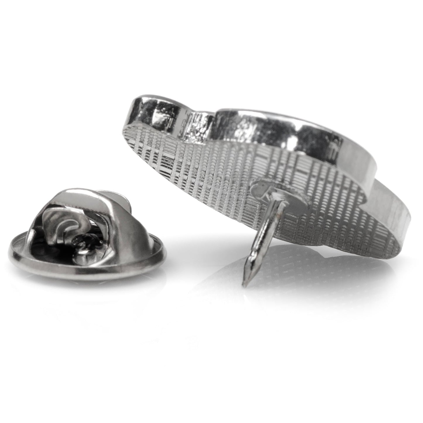 Metallic badge clasp on a white background
