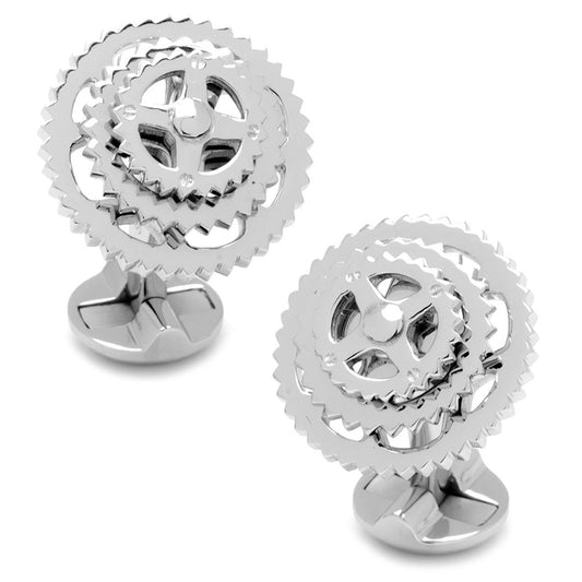 Silver gear-shaped cufflinks on a white background
