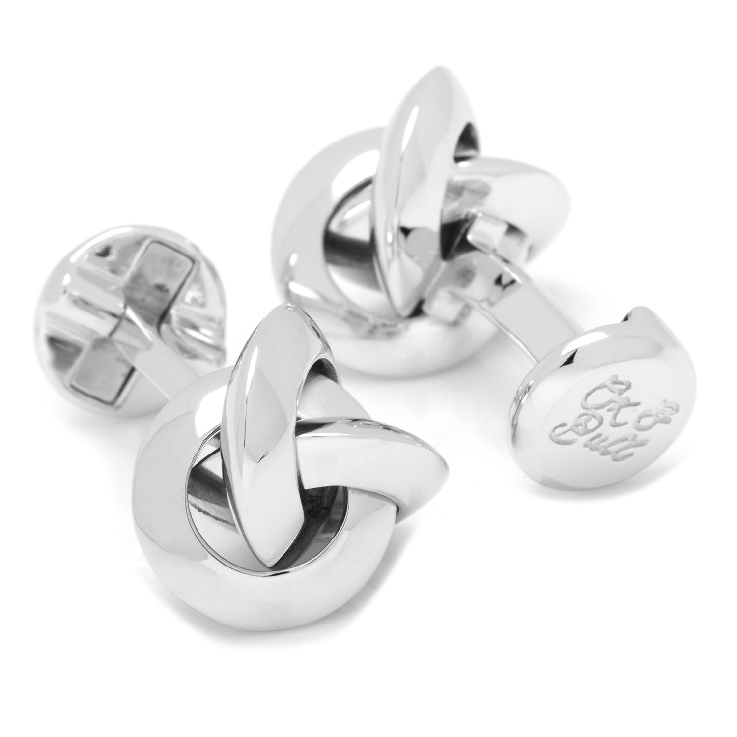 Silver knot cufflinks on a white background