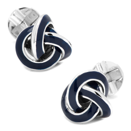 Pair of silver and blue knot-shaped cufflinks on a white background