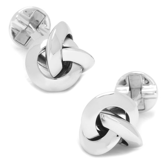 Silver knot cufflinks on a white background