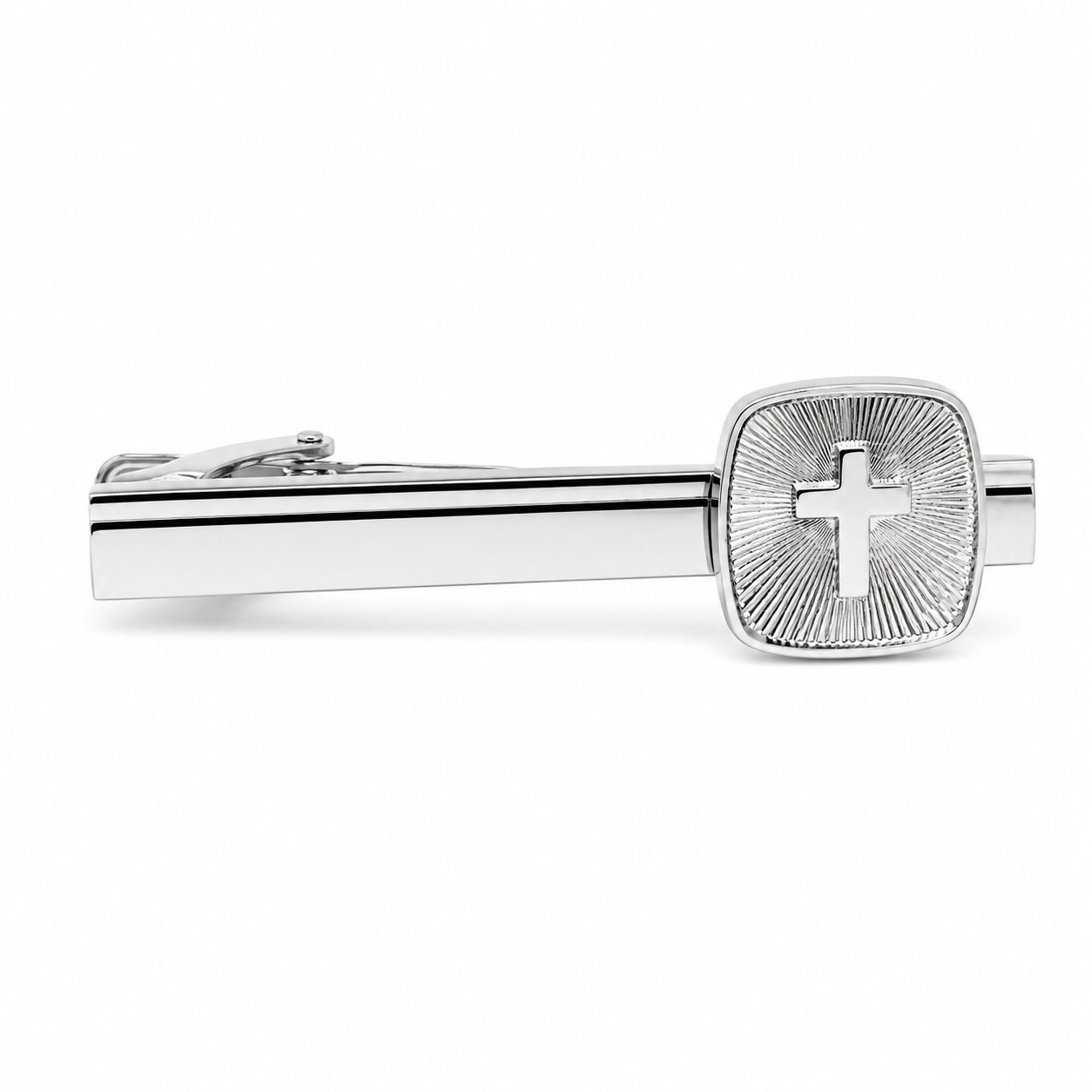 Radiant Cross Tie Clip in polished silver featuring a raised Christian cross surrounded by engraved sunburst rays, men's faith-inspired necktie accessory and Christian gift.