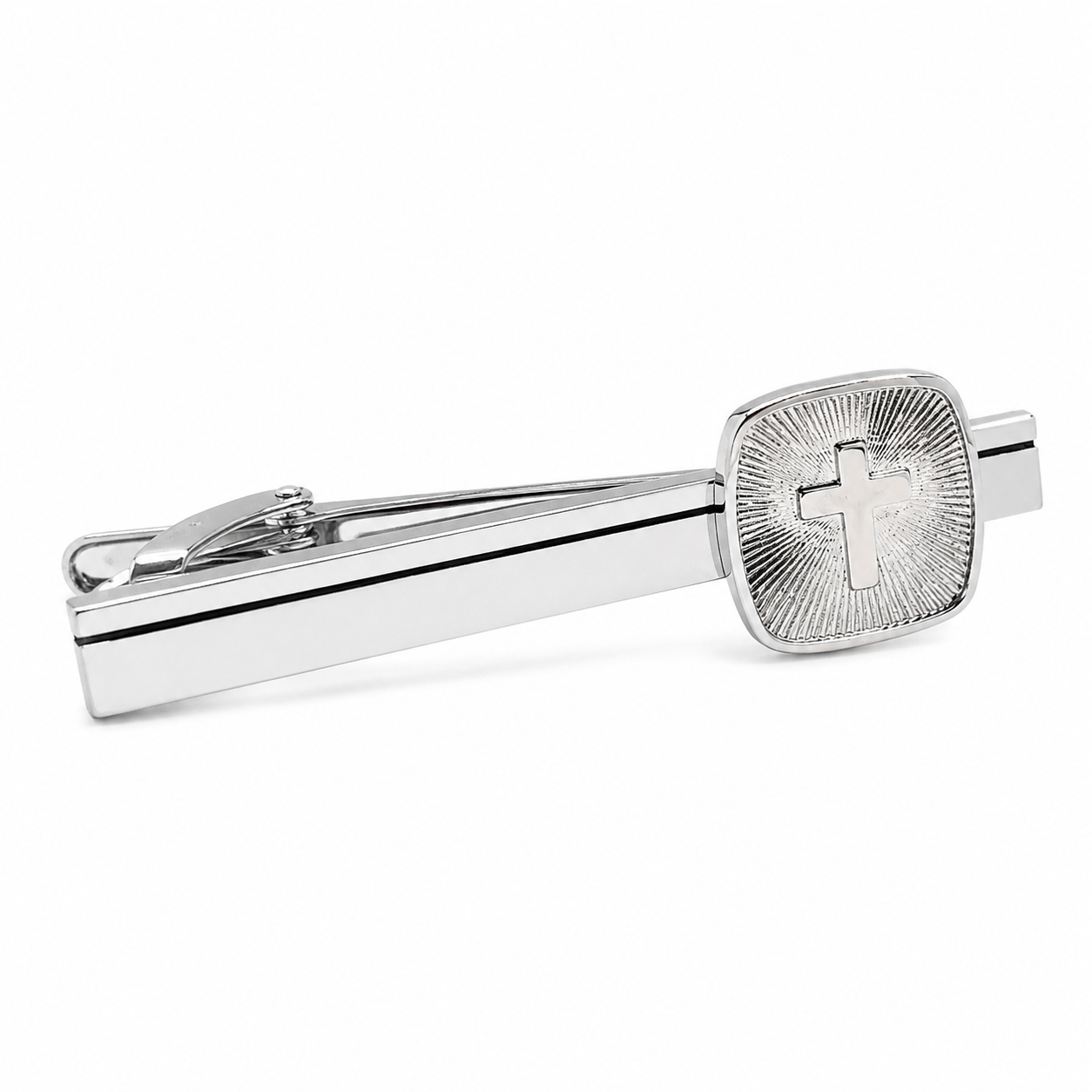 Radiant Cross Tie Clip in polished silver featuring a raised Christian cross surrounded by engraved sunburst rays, men's faith-inspired necktie accessory and Christian gift.