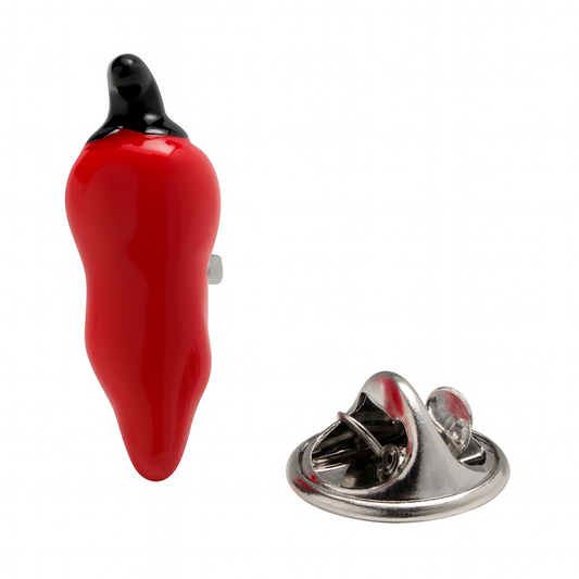 Red pepper-shaped lapel pin with a black top on a white background