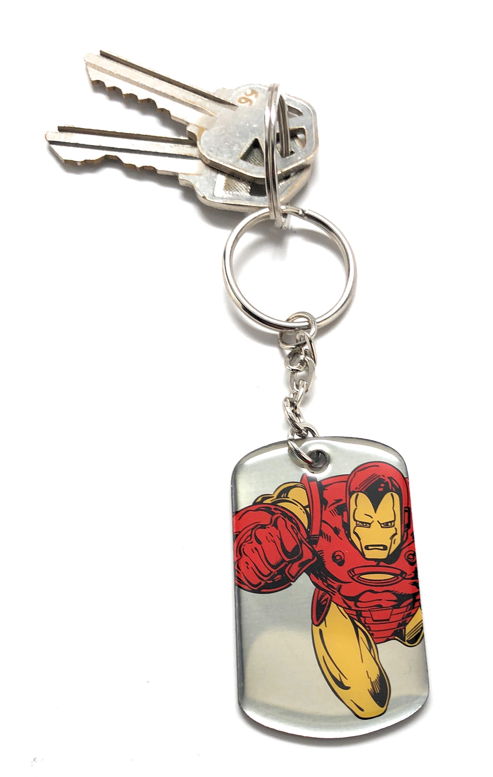 Red and gold comic-style superhero metal dog tag keychain with key ring and chain attached