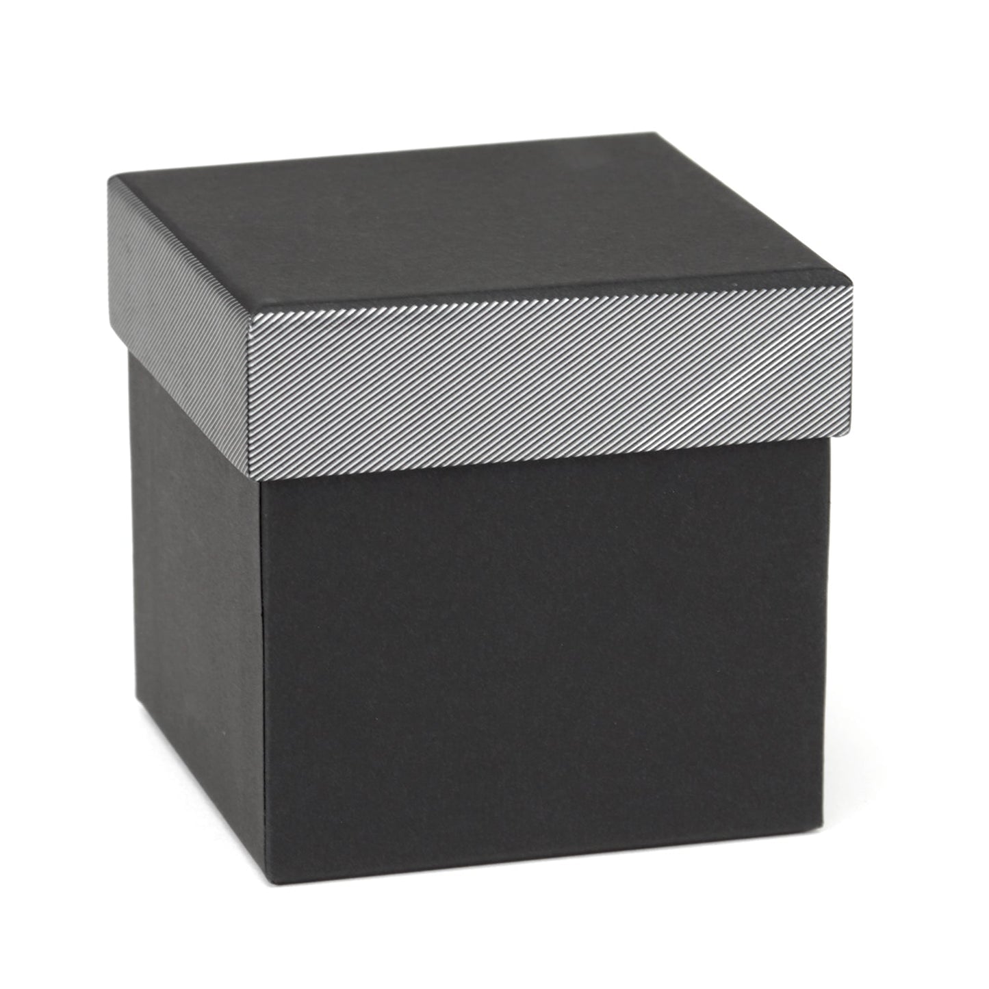 Black square box with a textured silver lid on a white background