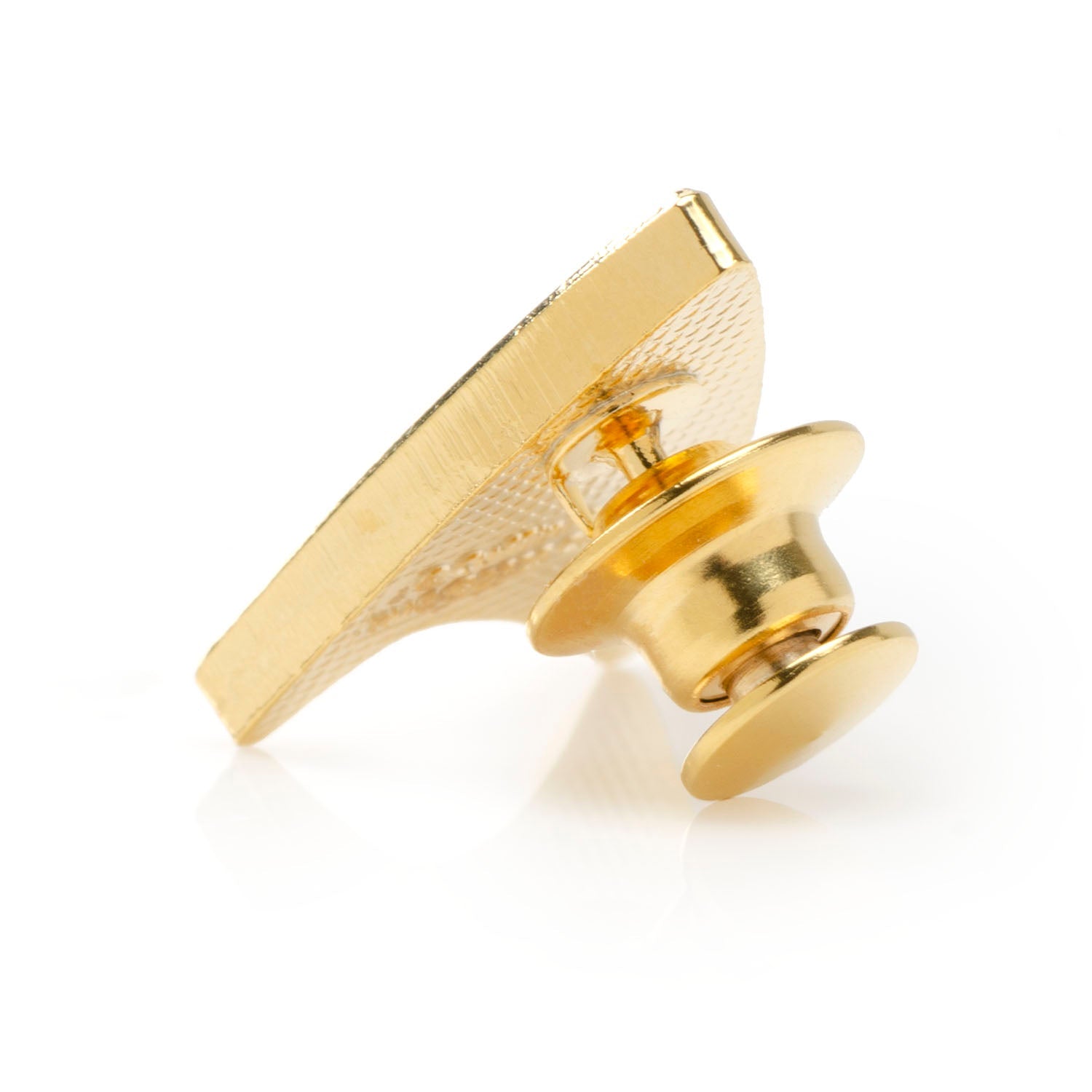 Gold metal badge on a white background