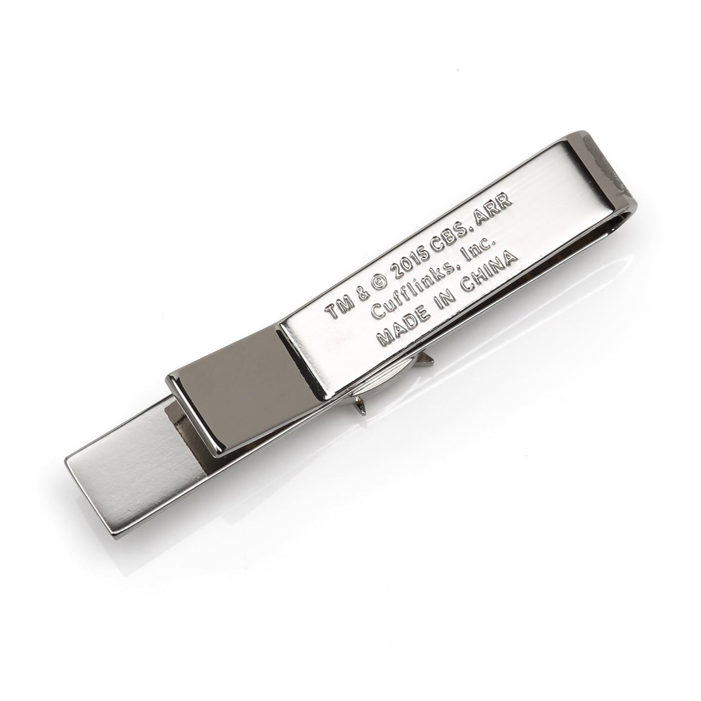 Silver tie clip with branding and text on a white background