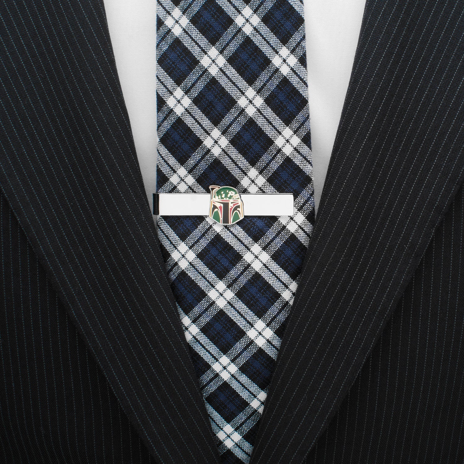 Plaid tie with a white clasp on a black pinstripe suit