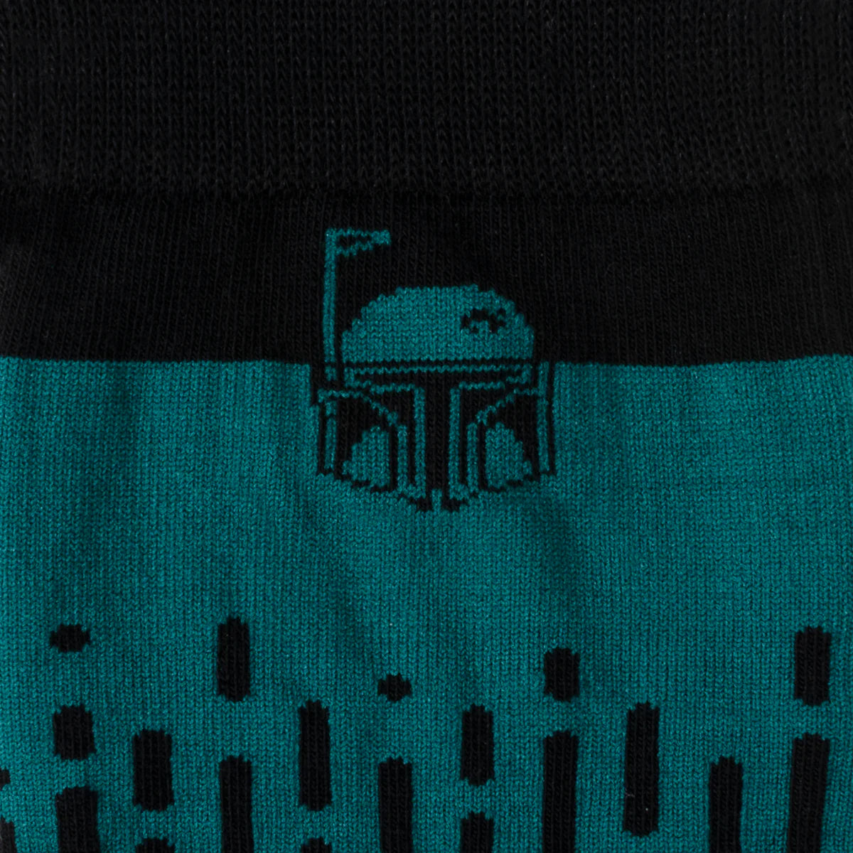 Teal and black patterned fabric with a logo on a black background